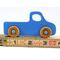 Handmade wooden toy pickup truck painted in baby blue with metallic sapphire blue trim. The truck features non-marring amber shellac wheels and is part of my Play Pal Collection. A close-up shot of the toy truck on a white background. Made to Order.